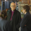 The Bishop of Leeds chats to a volunteer, inside InterAct Pantry